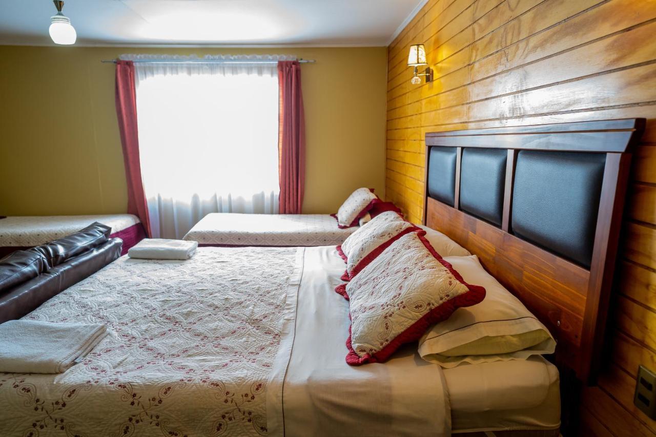 Casa Lucy Bed & Breakfast Пуерто Наталес Екстериор снимка