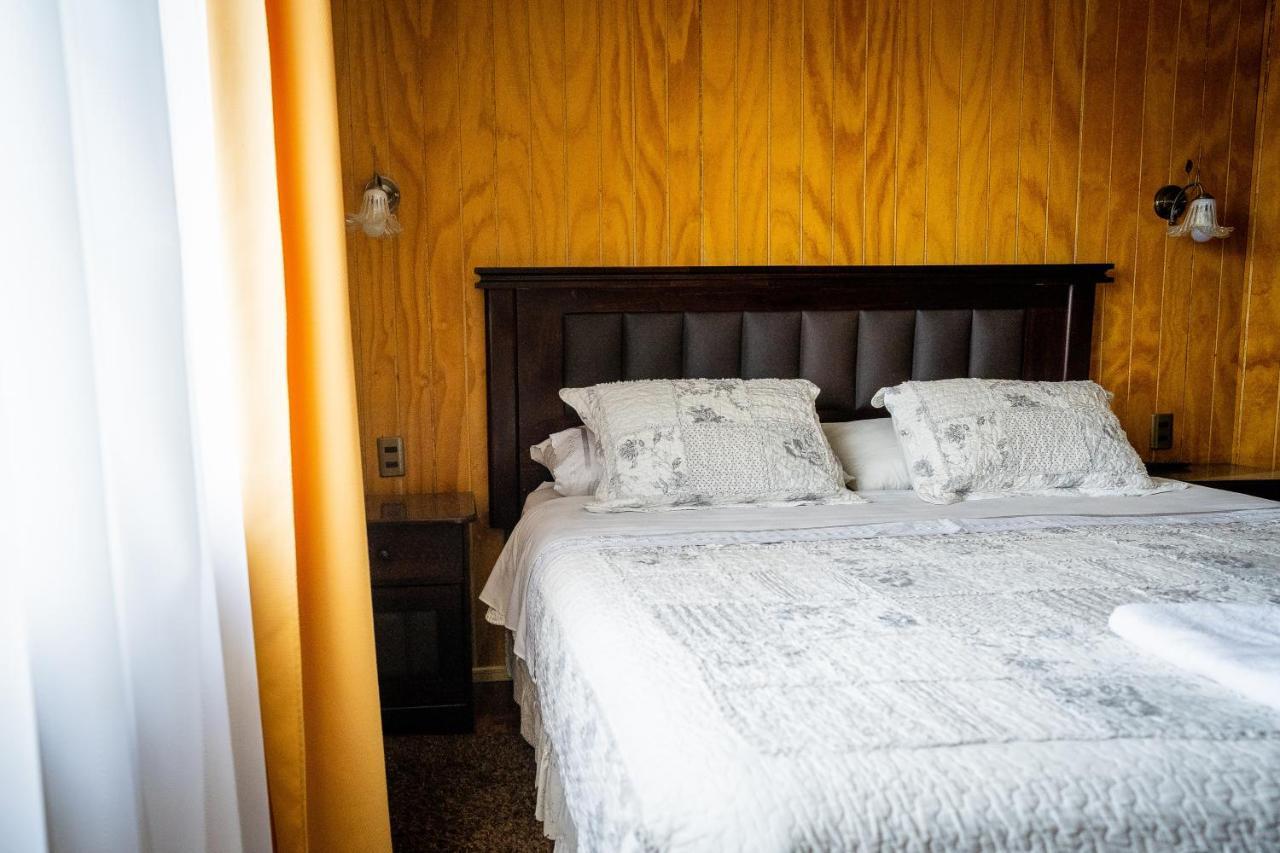 Casa Lucy Bed & Breakfast Пуерто Наталес Екстериор снимка