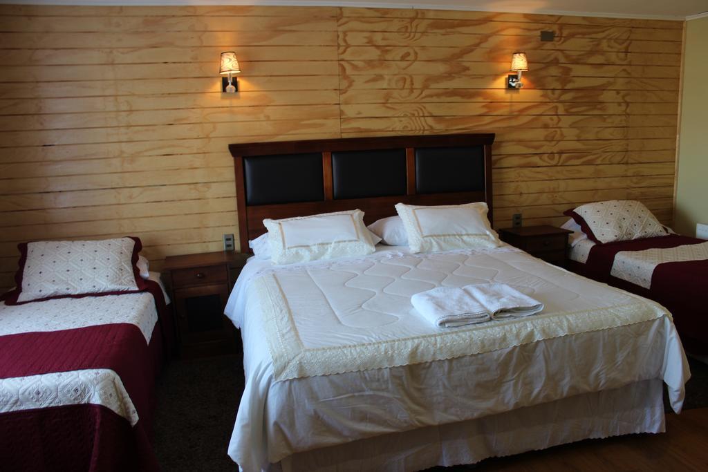 Casa Lucy Bed & Breakfast Пуерто Наталес Екстериор снимка